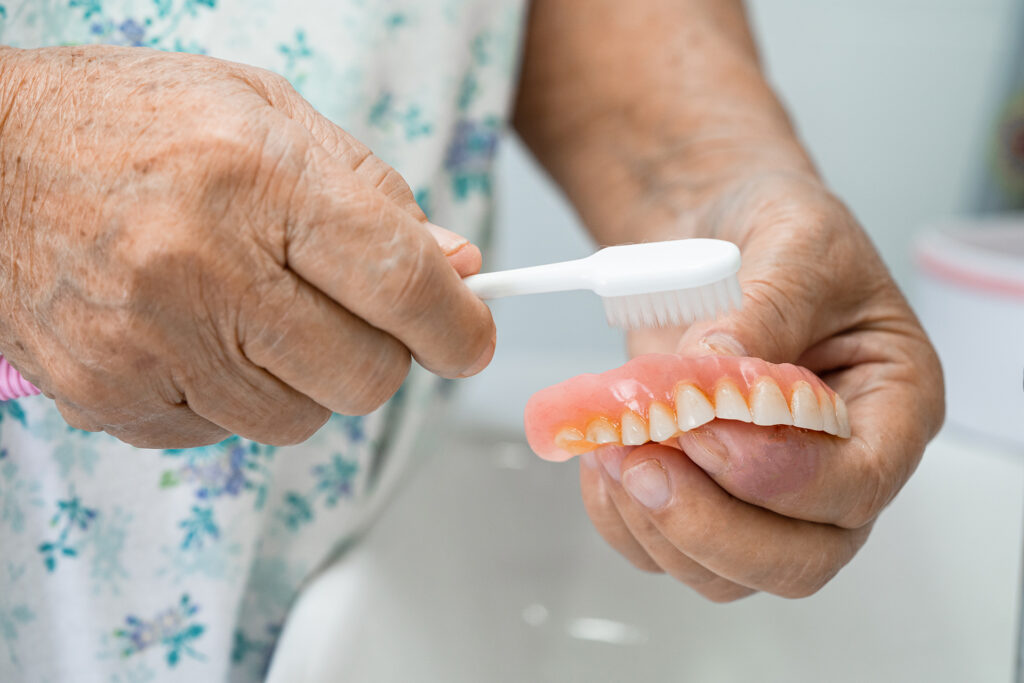 dentures vs dental implants